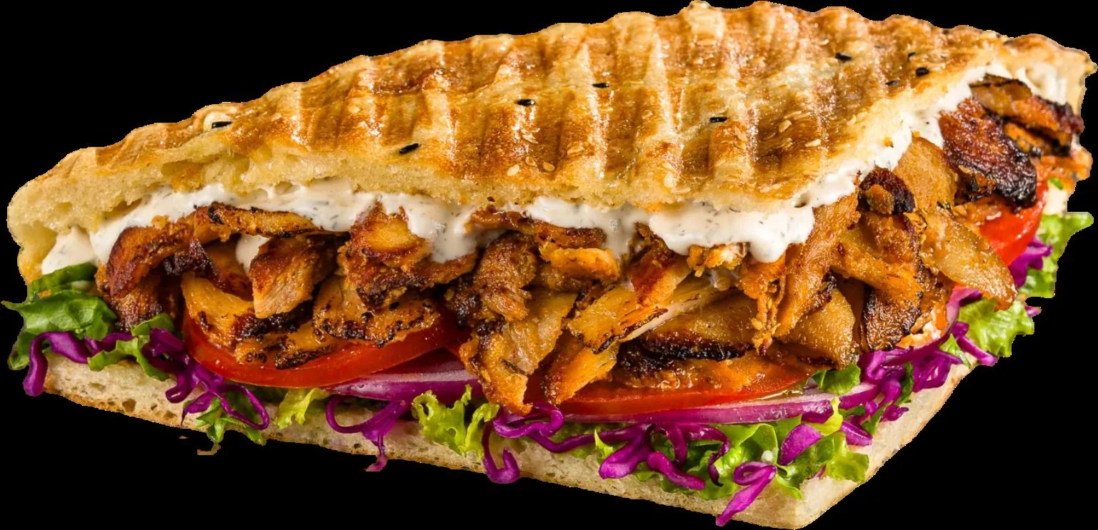 A cut German döner showing the depth of the vegetable load