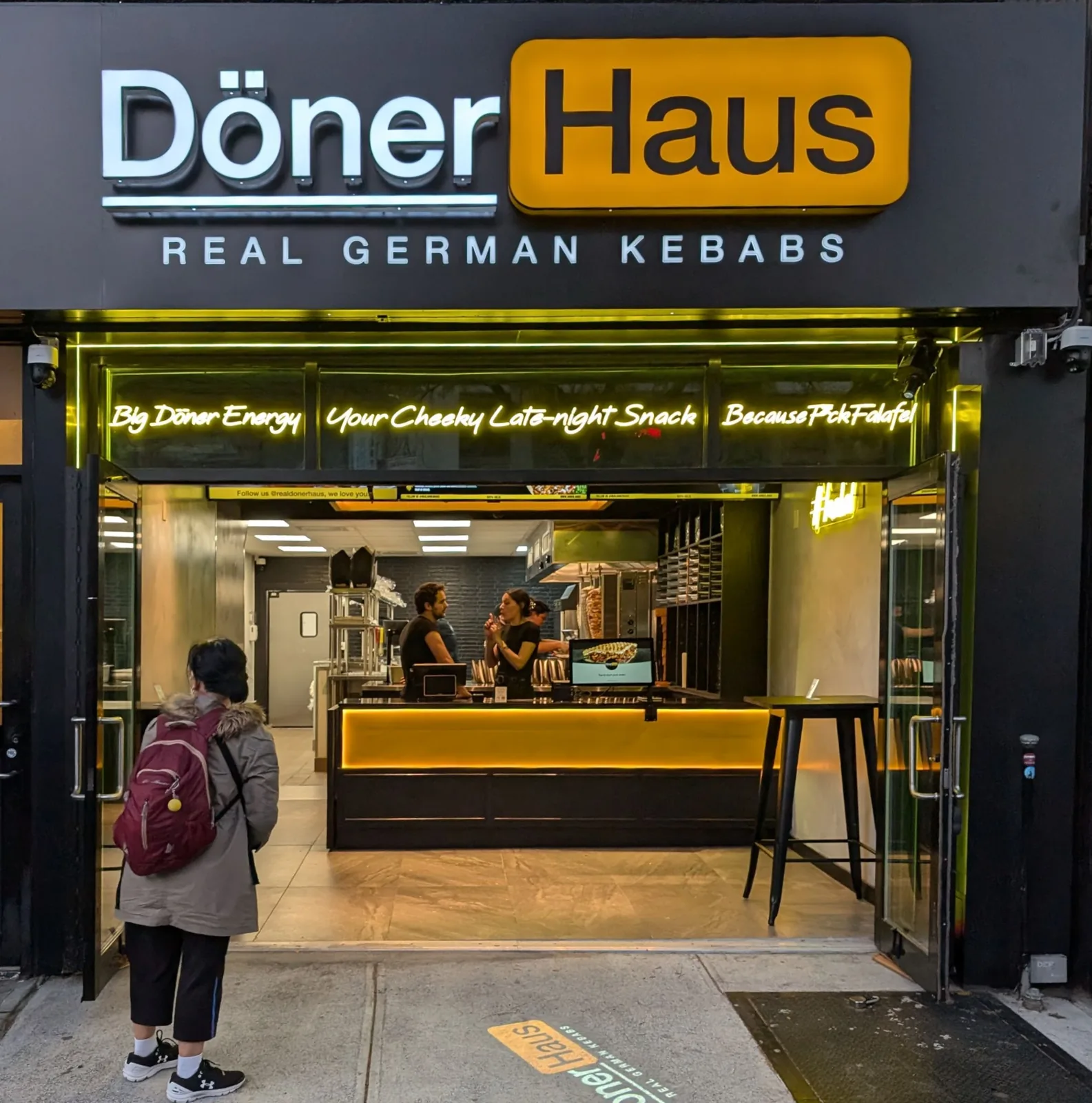 A German döner shop front on a city street in daylight